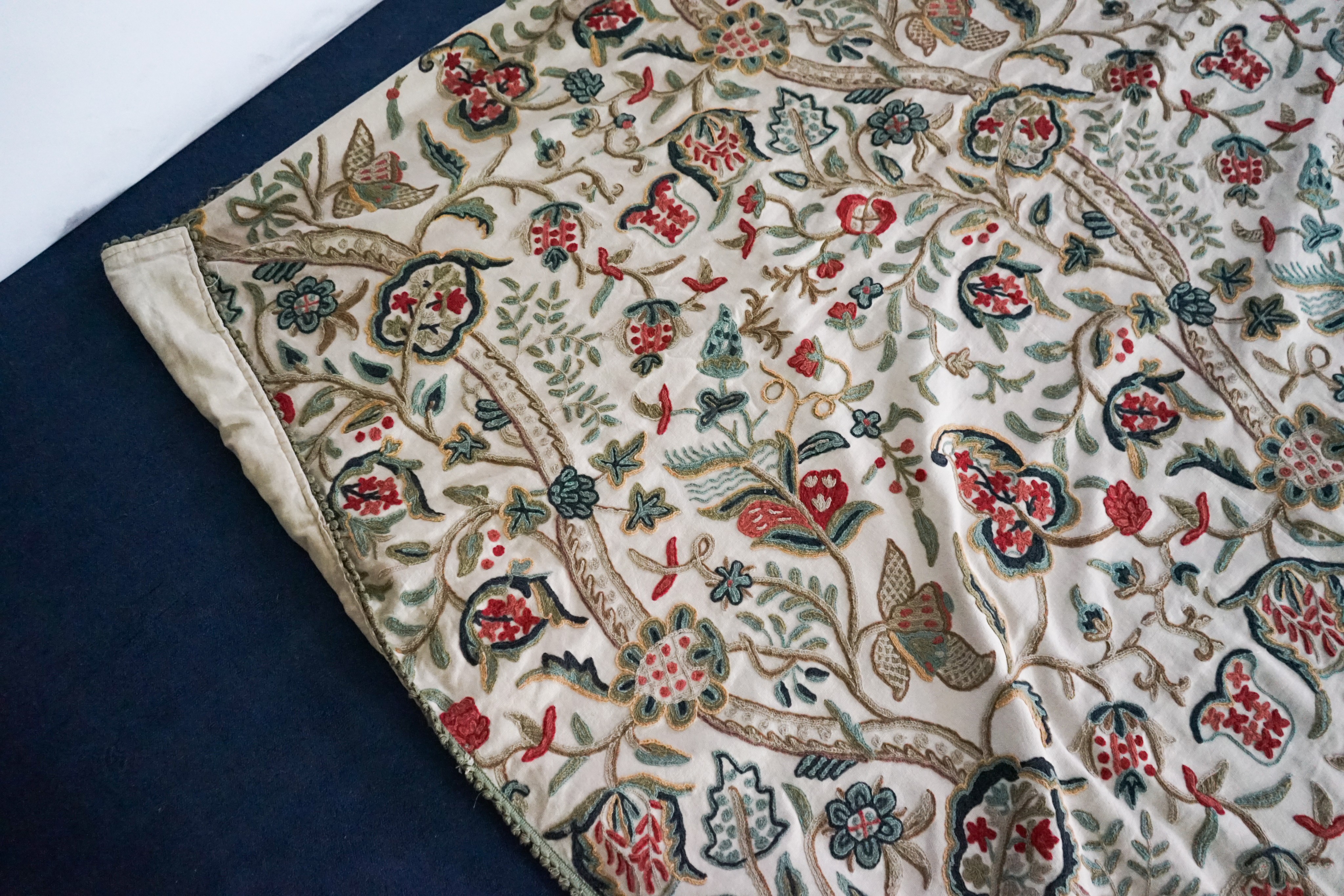 A Chelsea Textiles crewel work double bed spread, 550 x 260cm